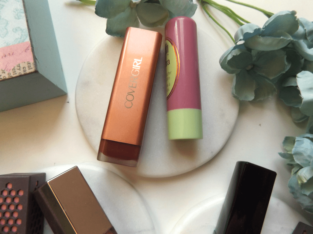 Covergirl Sultry Sienna beside Pixi natural rose lip balm